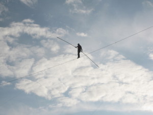 A person walking on a tightrope