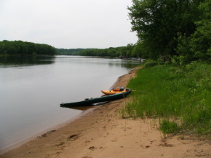 two kayaks on the riverbank