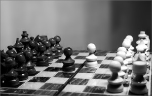 Chess board with opposing pawns facing off