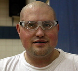 Picture of Scott with protective basketball goggles and a mouthguard