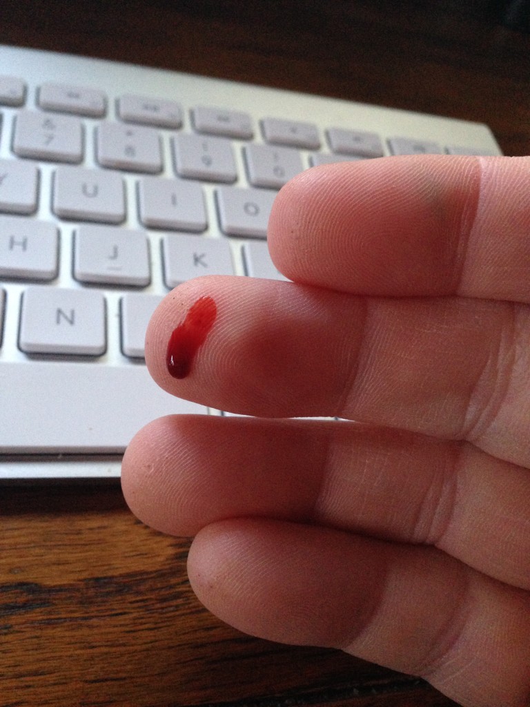 blood drop on a finger