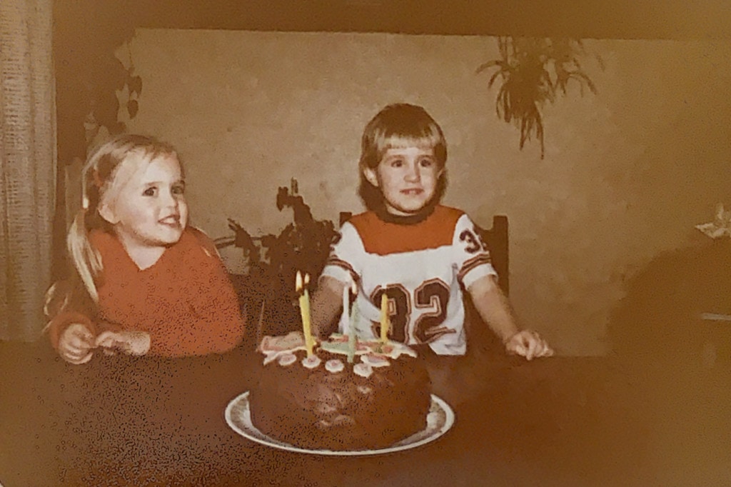 Me and my sister with my fifth birthday cake