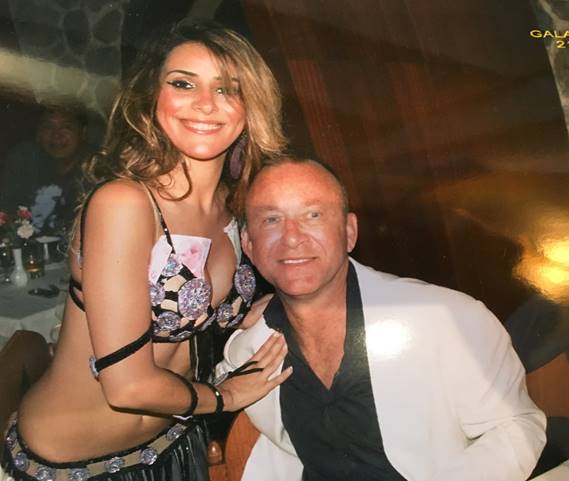 A picture of John next to a beautiful dancer in Istanbul.